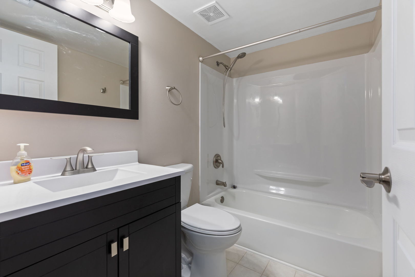 11134 NW Road, Unit 2C Palos Hills, IL 60465 - Photo 18 of 24 a bathroom with a sink a toilet and shower