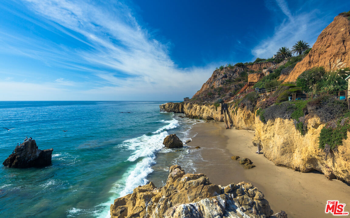 32232 Pacific Coast Highway Malibu, CA 90265 - Photo 12 of 26 a view of a yard with an outdoor space