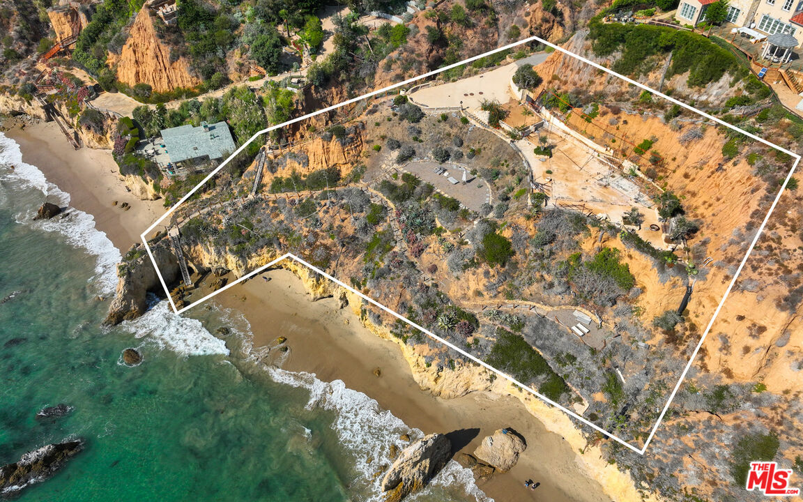 32232 Pacific Coast Highway Malibu, CA 90265 - Photo 5 of 26 a view of swimming pool with a yard