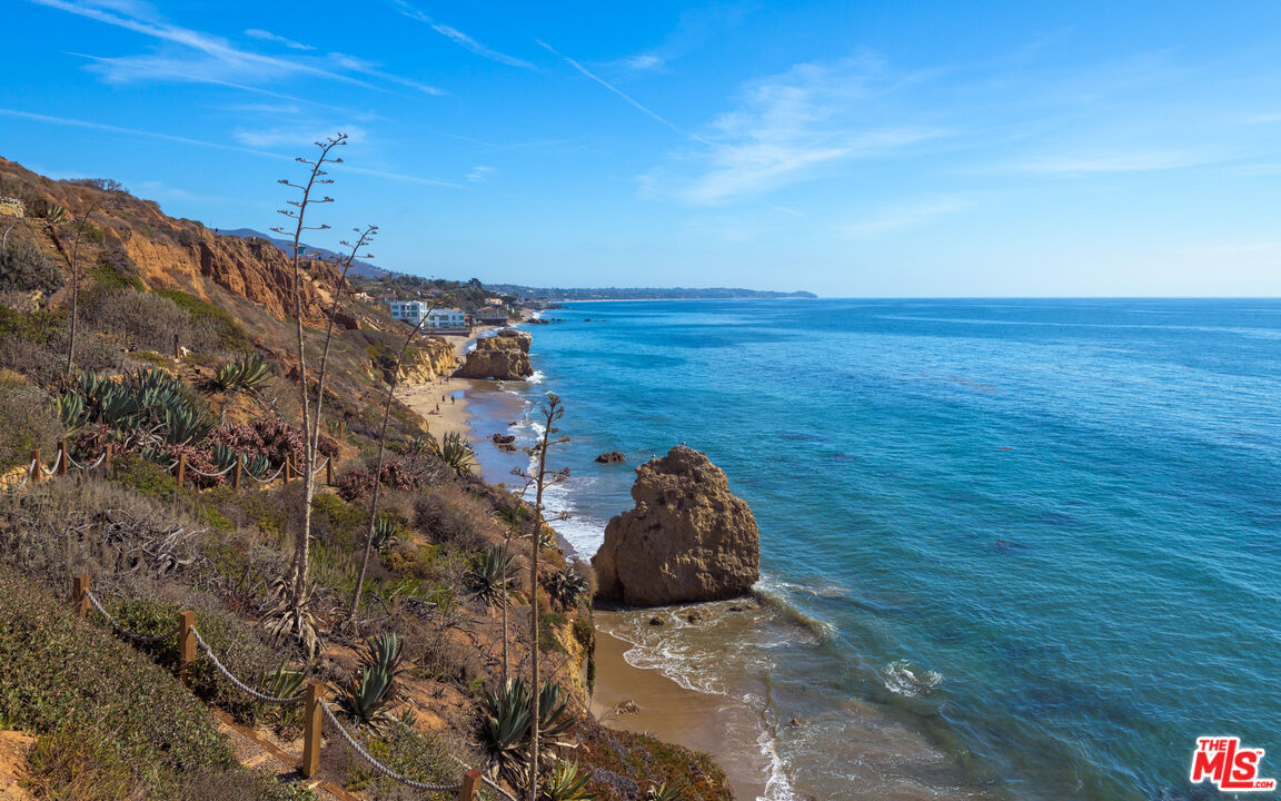 32232 Pacific Coast Highway Malibu, CA 90265 - Photo 9 of 26 a view of a dry yard with wooden fence