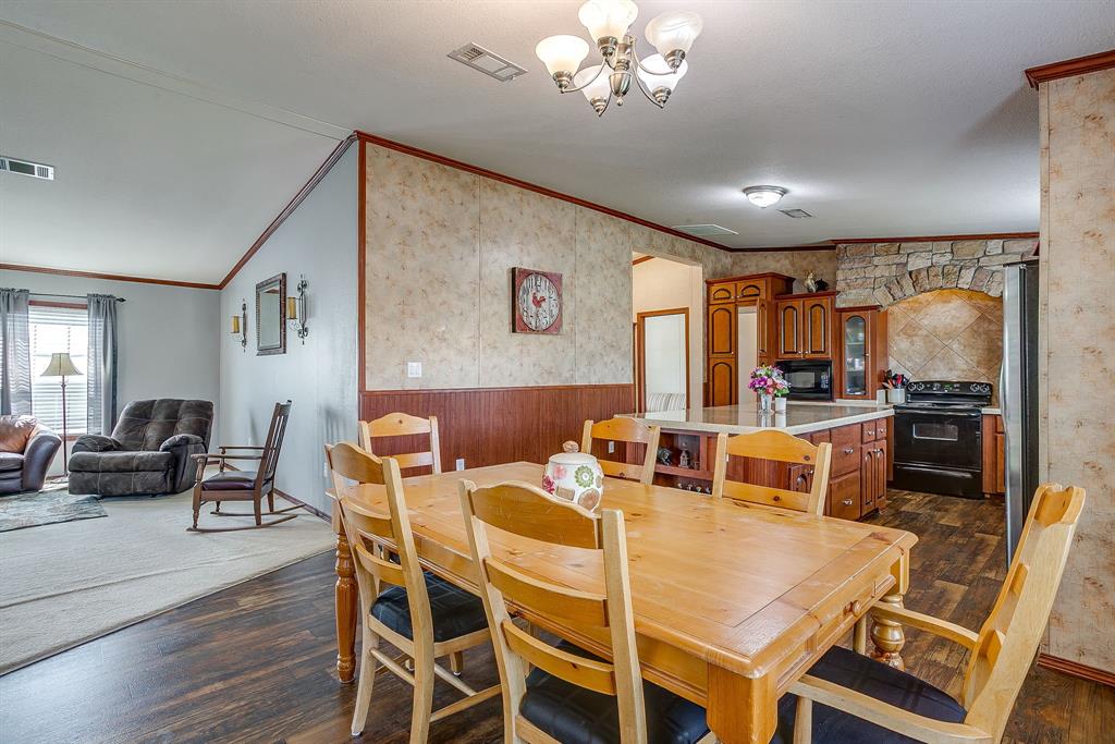 321 Young Road Millsap, TX 76066 - Photo 10 of 28 a view of a dining room with furniture