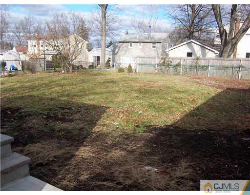 76 Middle Hill Road Colonia, NJ 07067 - Photo 12 of 12 a view of a town with big trees