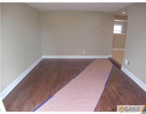 76 Middle Hill Road Colonia, NJ 07067 - Photo 7 of 12 a view of an empty room and window