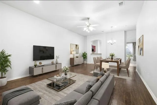 a kitchen with stainless steel appliances granite countertop a stove sink and cabinets