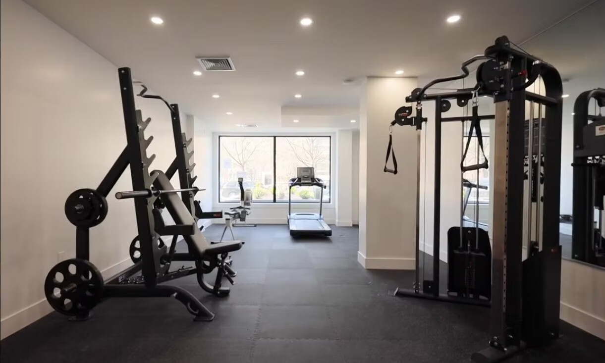 379 Ocean Parkway, Unit 2B Brooklyn, NY 11218 - Photo 22 of 24 a view of a room with gym equipment