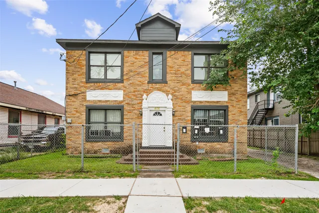 a front view of a house with a porch