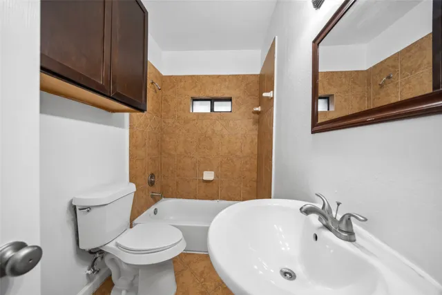 a bathroom with a sink and a toilet
