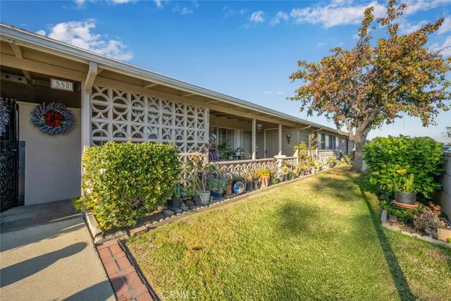 a view of swimming pool with outdoor seating