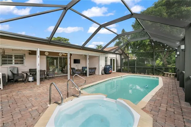 a view of a backyard with furniture and porch