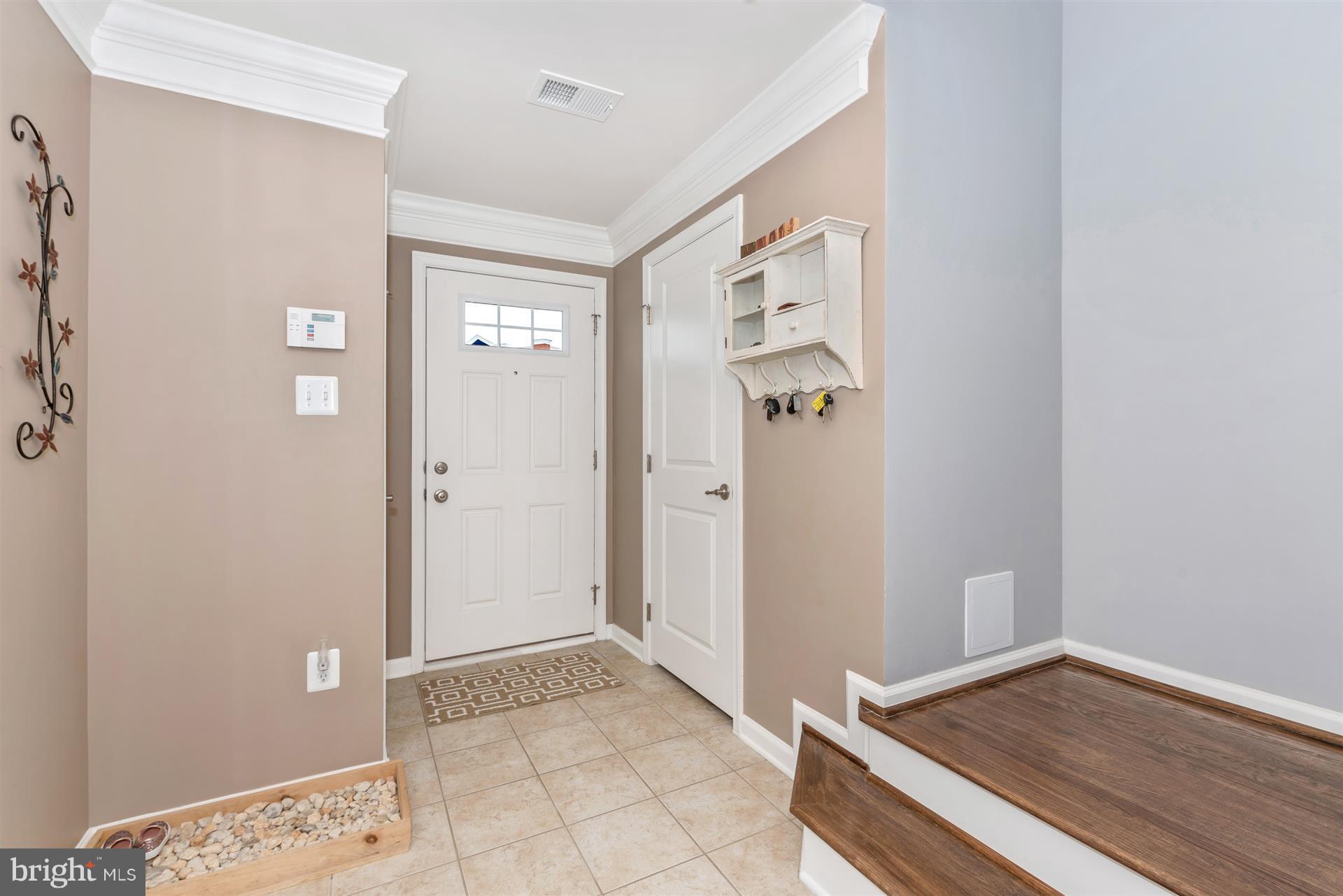 7837 Wormans Mill Road Frederick, MD 21701 - Photo 3 of 30 Lower Level Entry Foyer with Coat Closet