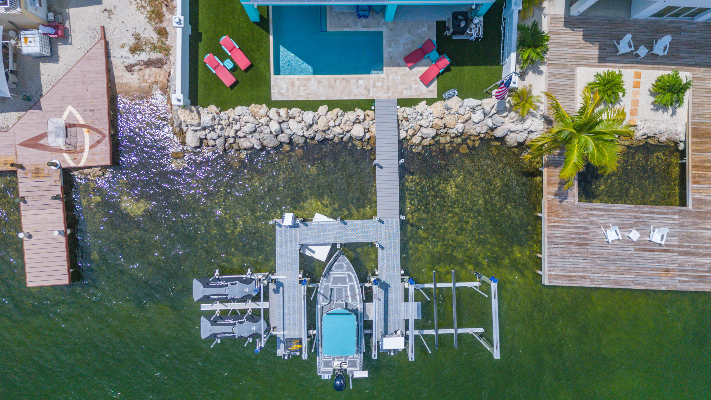 747 La Fitte Road Summerland Key, FL 33042 - Photo 9 of 103 a view of an chairs and tables in the patio