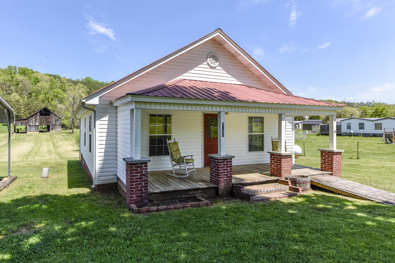 2021 Sockless Road Dandridge, TN 37725 - Photo 1 of 19 a view of a house with a backyard patio and swimming pool