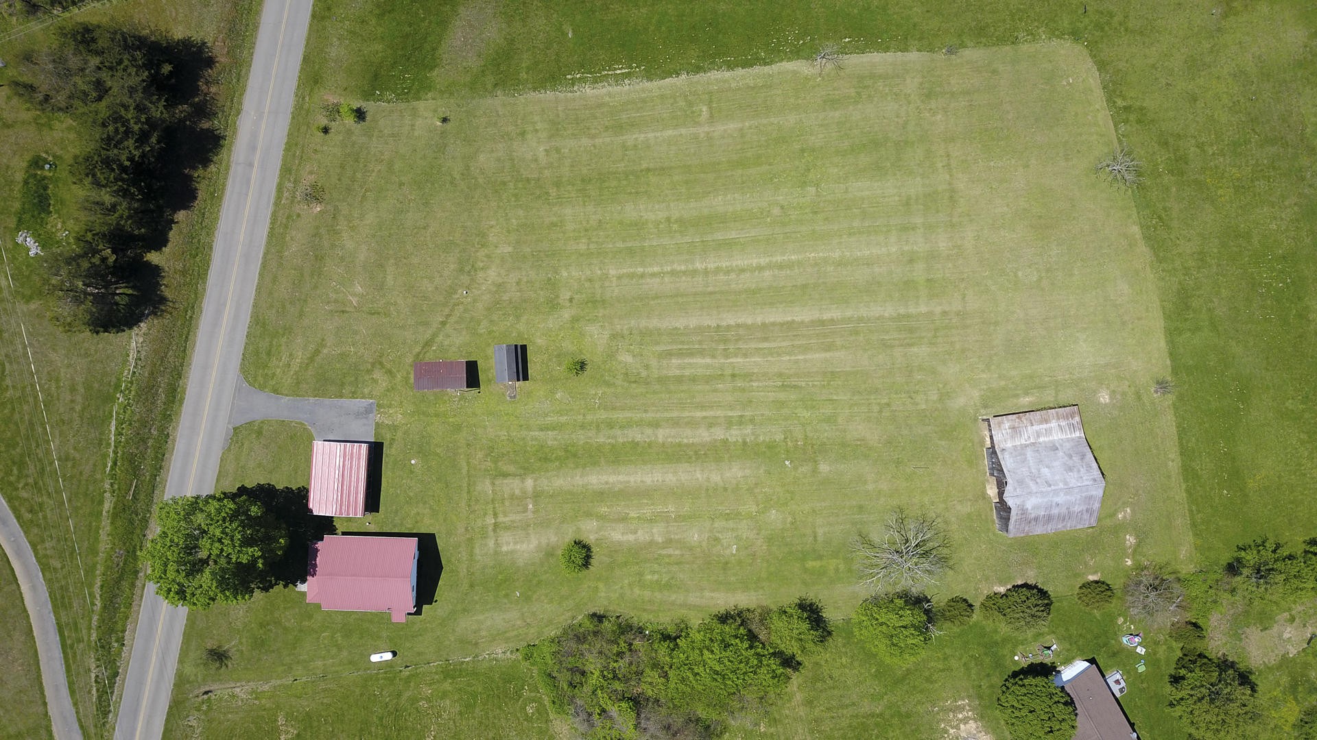 2021 Sockless Road Dandridge, TN 37725 - Photo 18 of 19 a aerial view of residential house with pool and yard