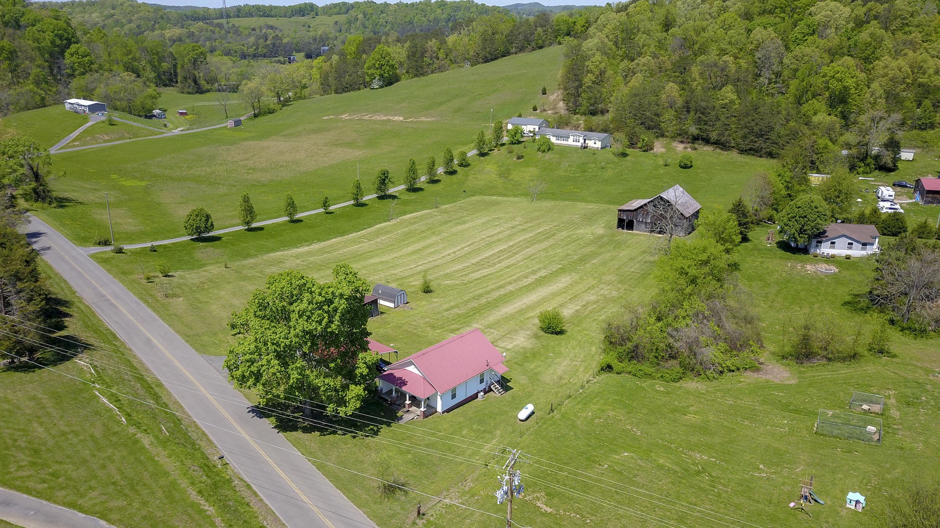 2021 Sockless Road Dandridge, TN 37725 - Photo 3 of 19 a view of a lush green field