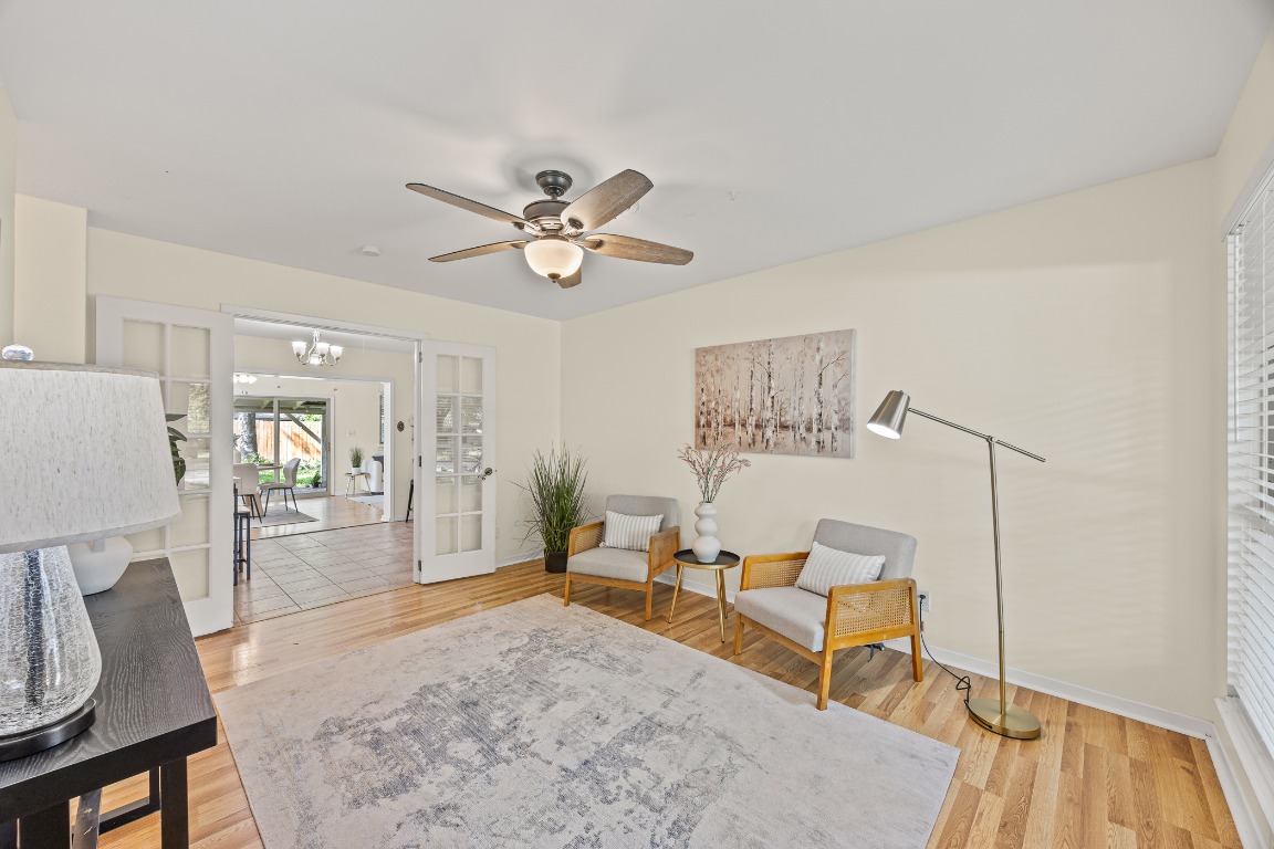 3205 Whites Drive Austin, TX 78735 - Photo 5 of 31 a living room with furniture and a wooden floor