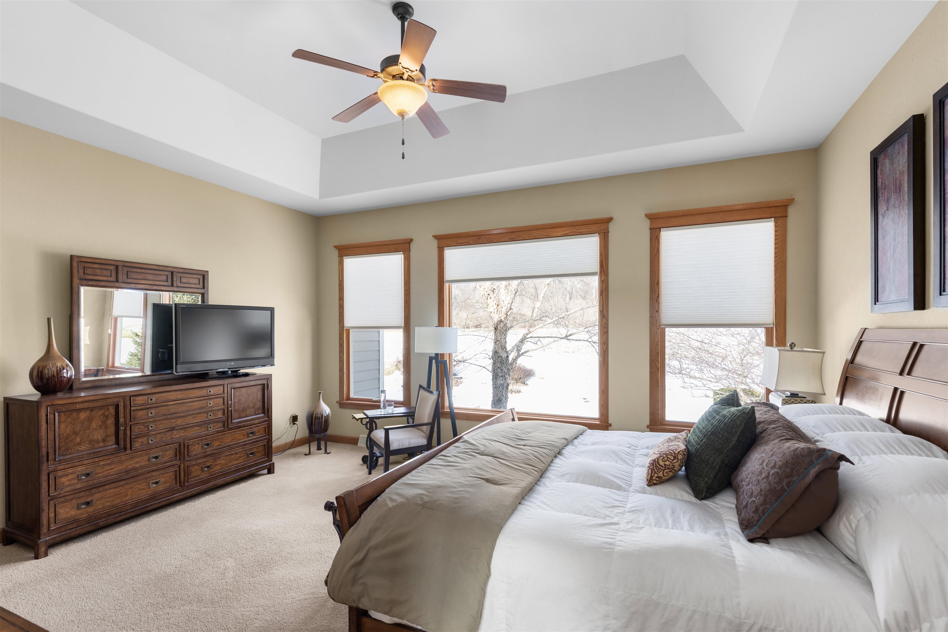 978 Weatherfield Way Belvidere, IL 61008 - Photo 15 of 41 a bedroom with a large bed and a flat screen tv