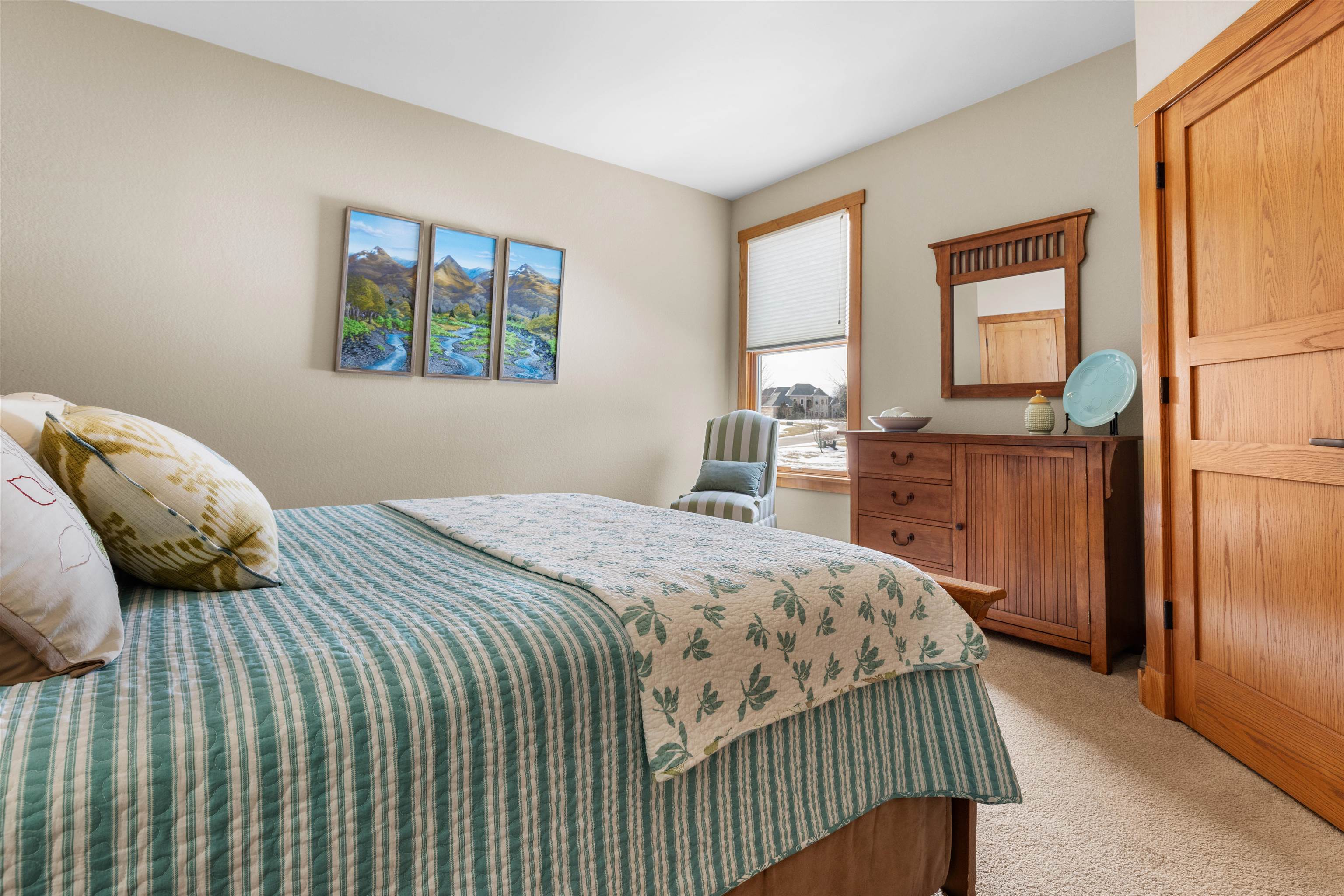 978 Weatherfield Way Belvidere, IL 61008 - Photo 27 of 41 a bedroom with a bed and a table next to a window