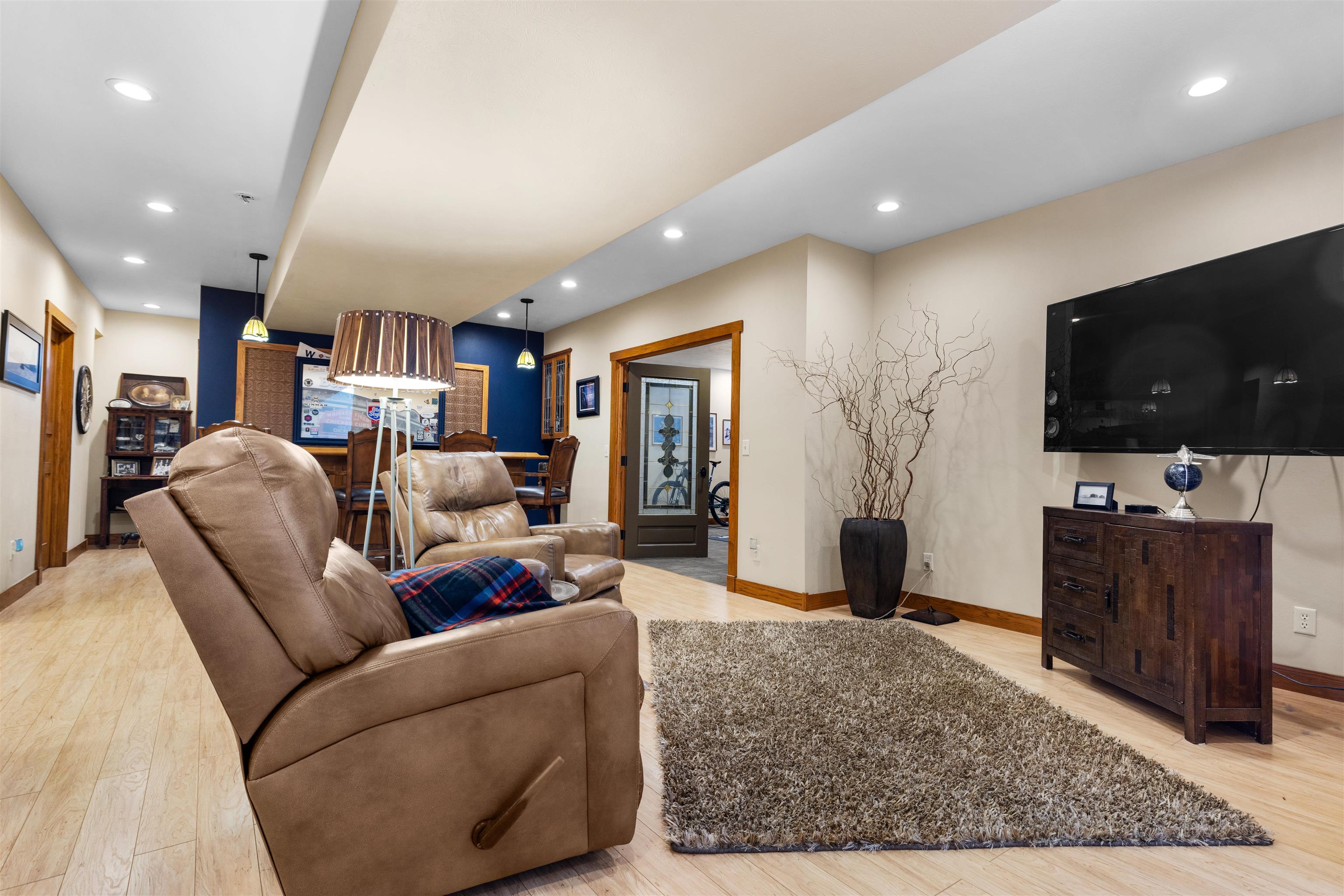 978 Weatherfield Way Belvidere, IL 61008 - Photo 28 of 41 a living room with furniture and a flat screen tv