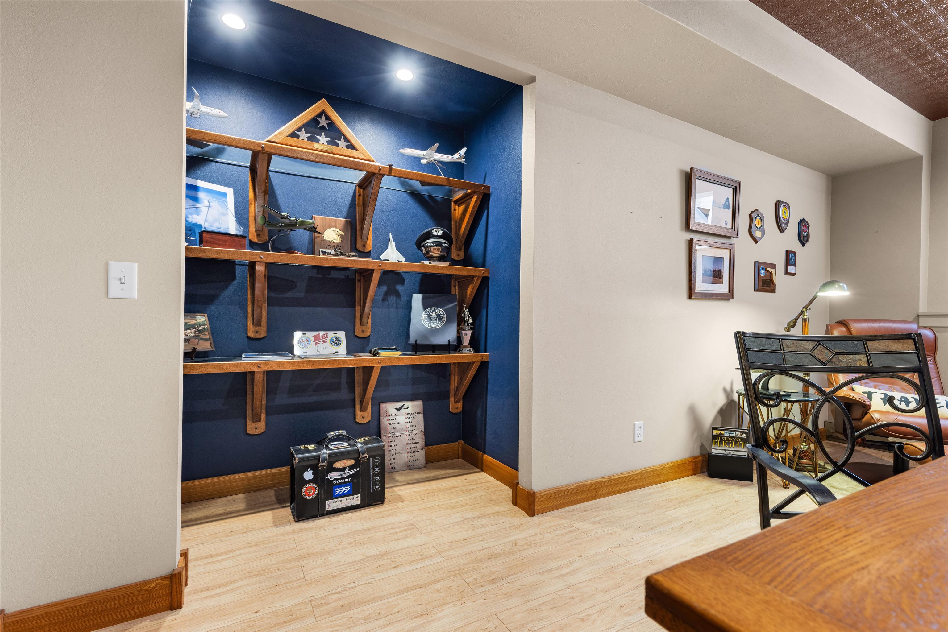 978 Weatherfield Way Belvidere, IL 61008 - Photo 32 of 41 a view of a workspace with furniture and wooden floor