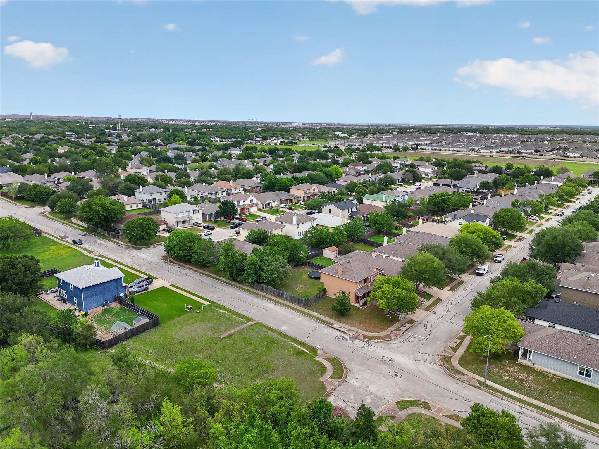11908 Athens Street Manor, TX 78653 - Photo 4 of 15 an aerial view of residential houses with outdoor space and swimming pool