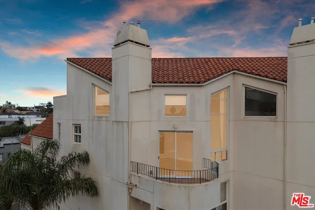 a view of a bed and a car in a bathroom