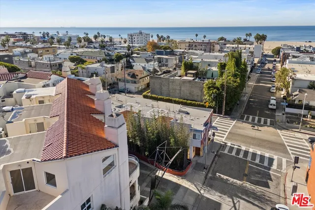 an aerial view of a city with lots of residential buildings