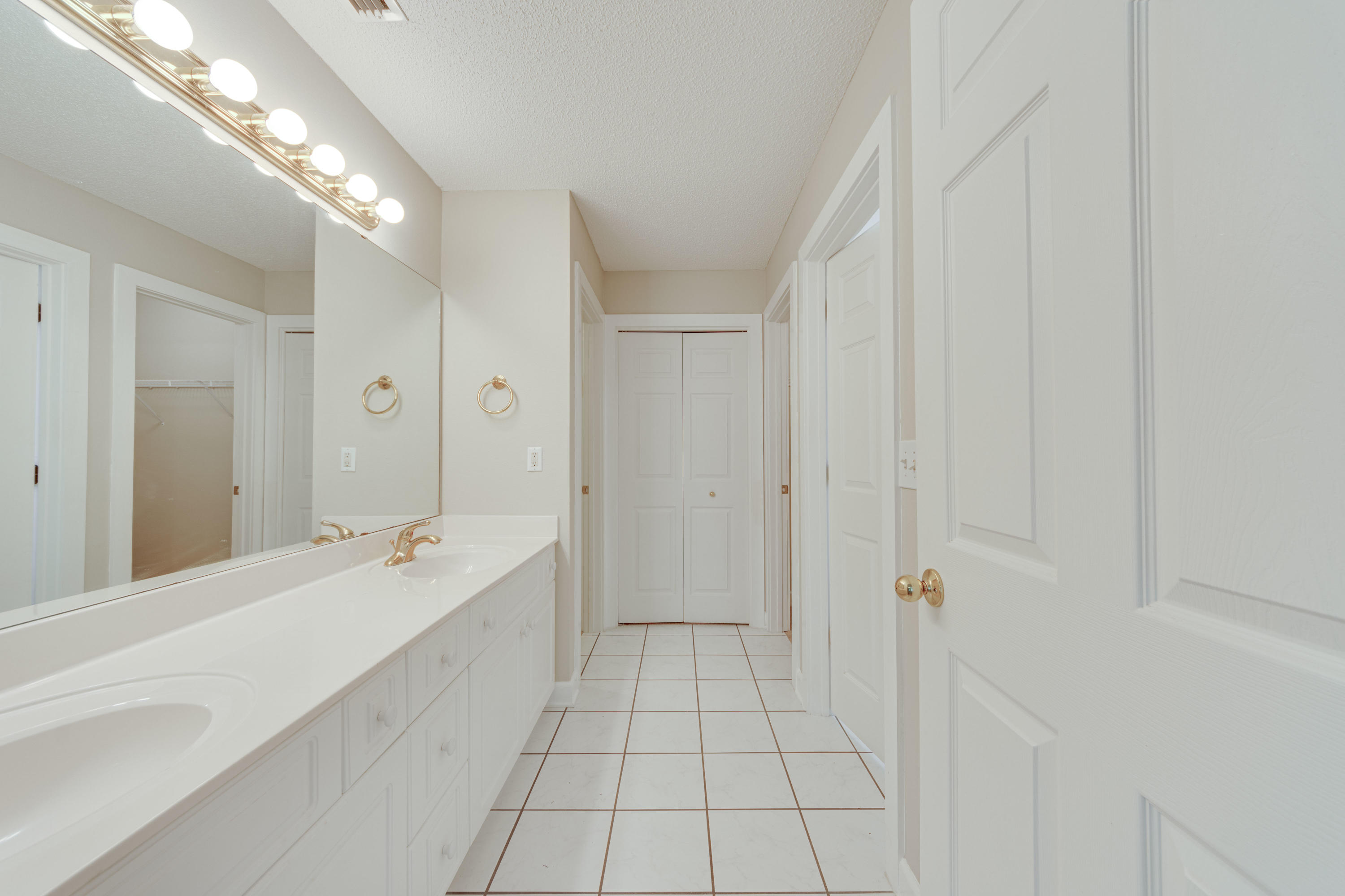135 Gulfwinds Way Santa Rosa Beach, FL 32459 - Photo 19 of 51 a spacious bathroom with a tub shower and sink
