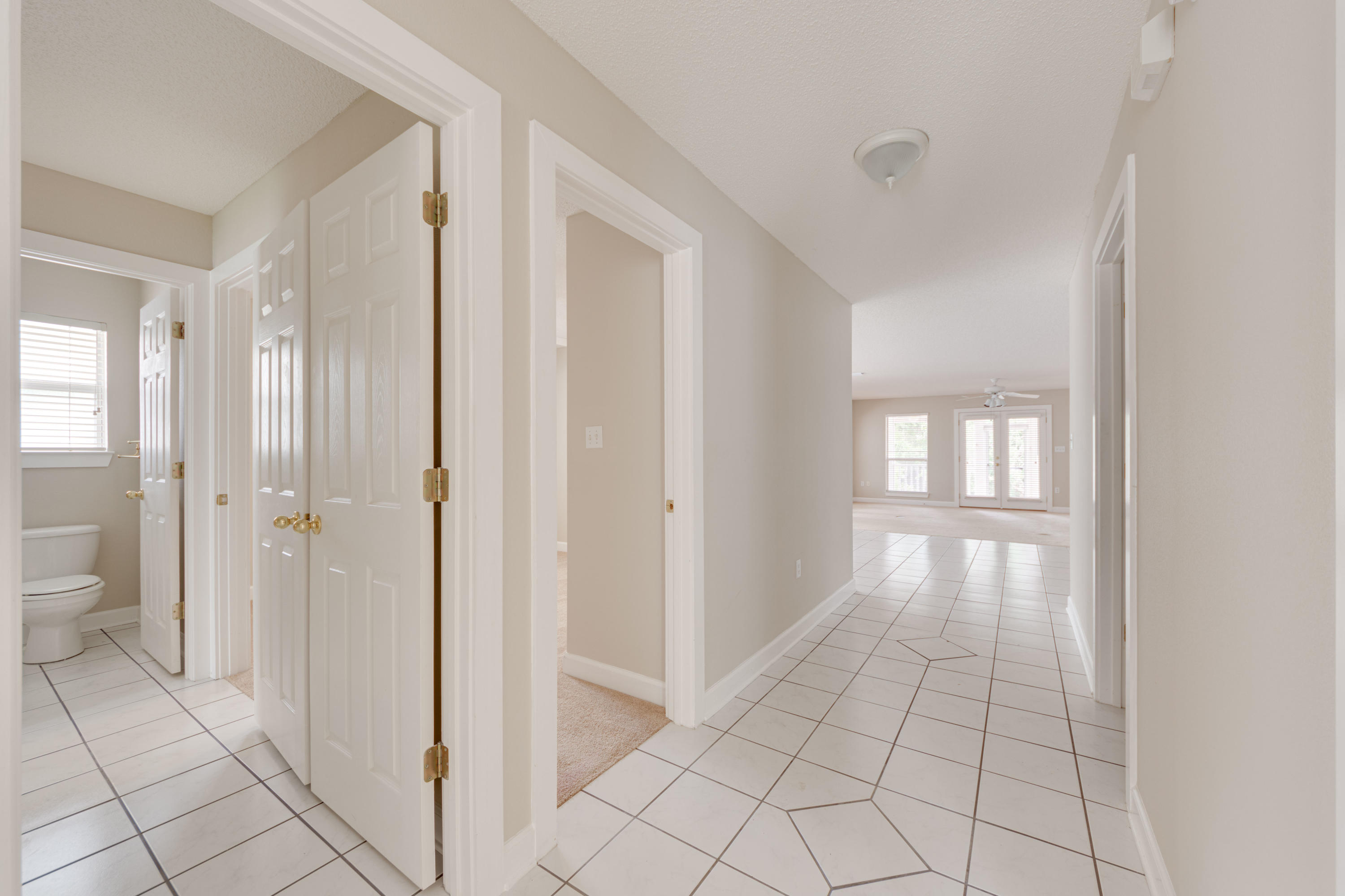 135 Gulfwinds Way Santa Rosa Beach, FL 32459 - Photo 25 of 51 a view of an empty room and window