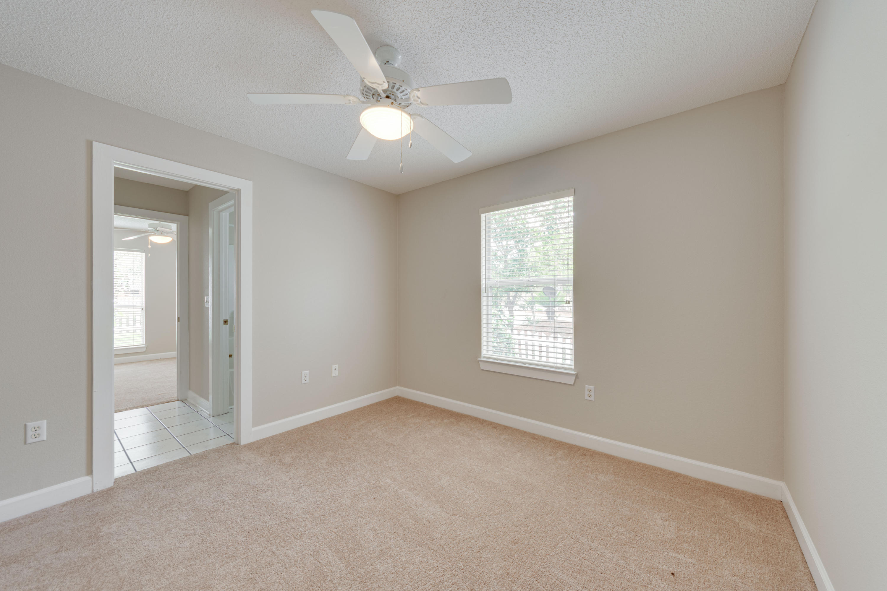 135 Gulfwinds Way Santa Rosa Beach, FL 32459 - Photo 46 of 51 an empty room with windows and closet