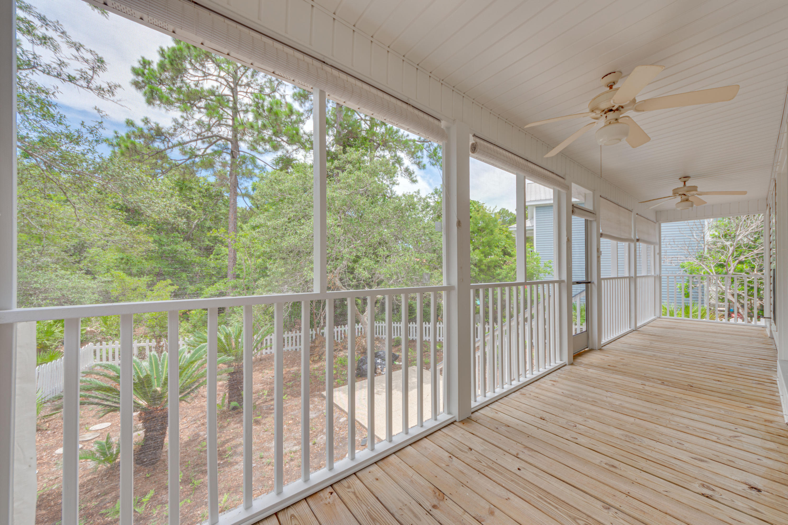 135 Gulfwinds Way Santa Rosa Beach, FL 32459 - Photo 49 of 51 a view of a balcony with wooden floor