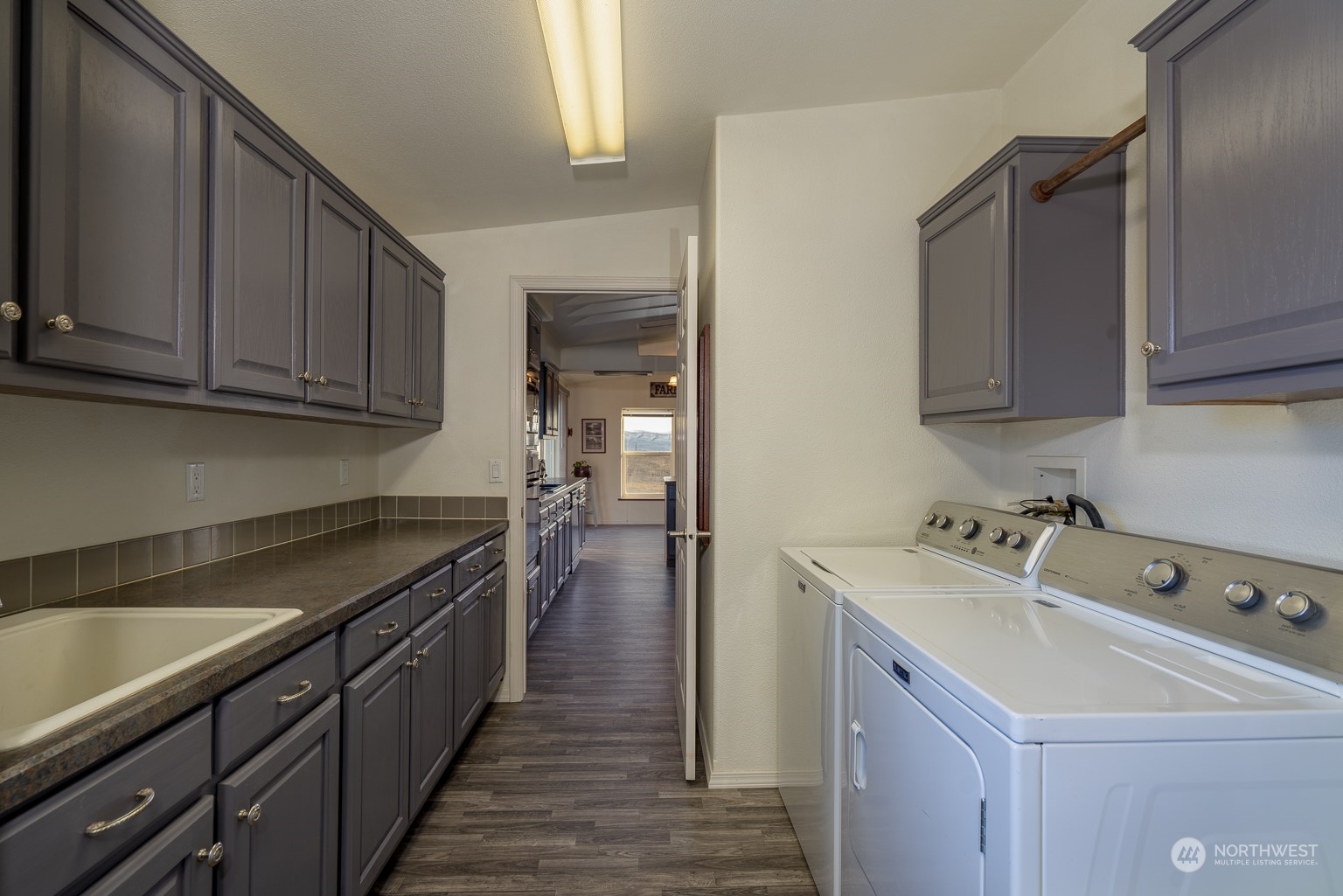 2416 Clerf Road Kittitas, WA 98926 - Photo 13 of 25 a kitchen with a sink cabinets and appliances