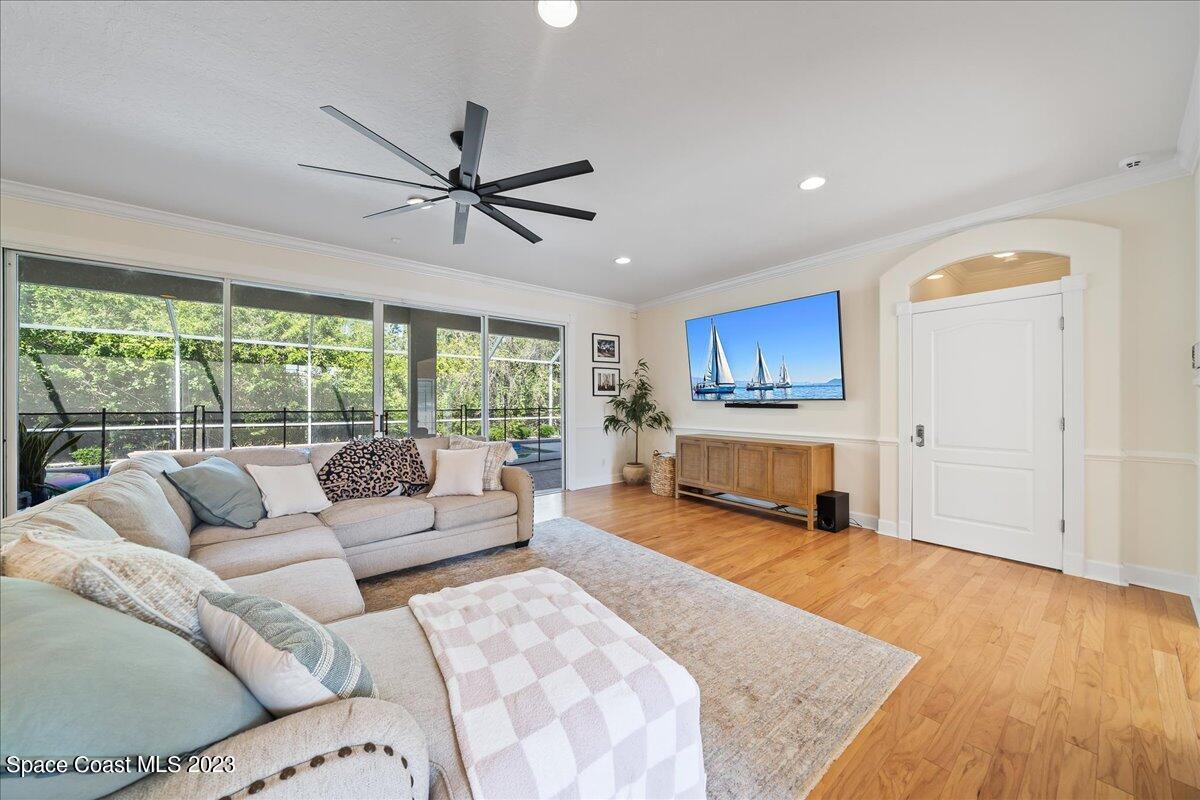 250 Baytree Drive Melbourne, FL 32940 - Photo 11 of 61 a living room with furniture and a large window