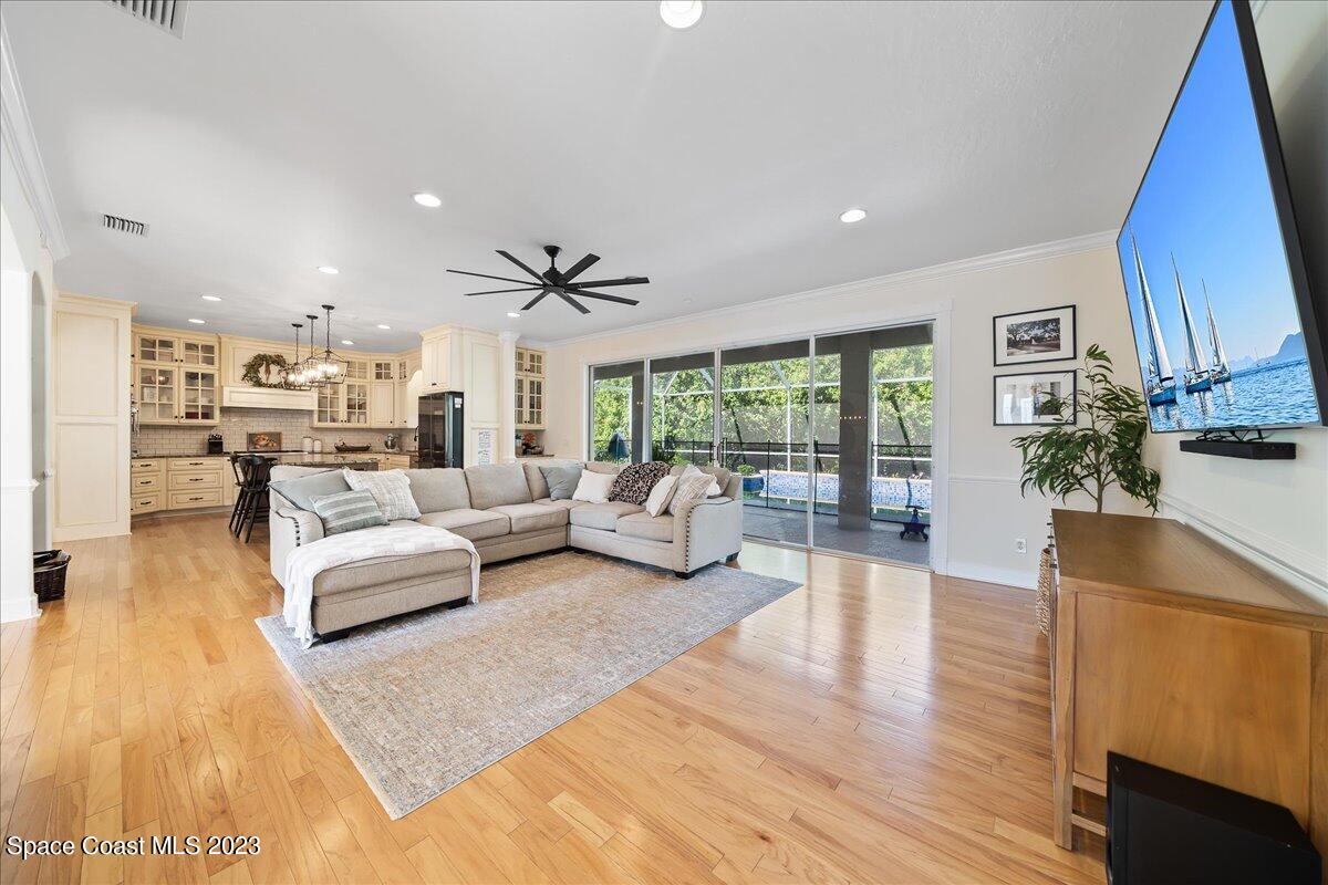 250 Baytree Drive Melbourne, FL 32940 - Photo 13 of 61 a living room with furniture and a large window