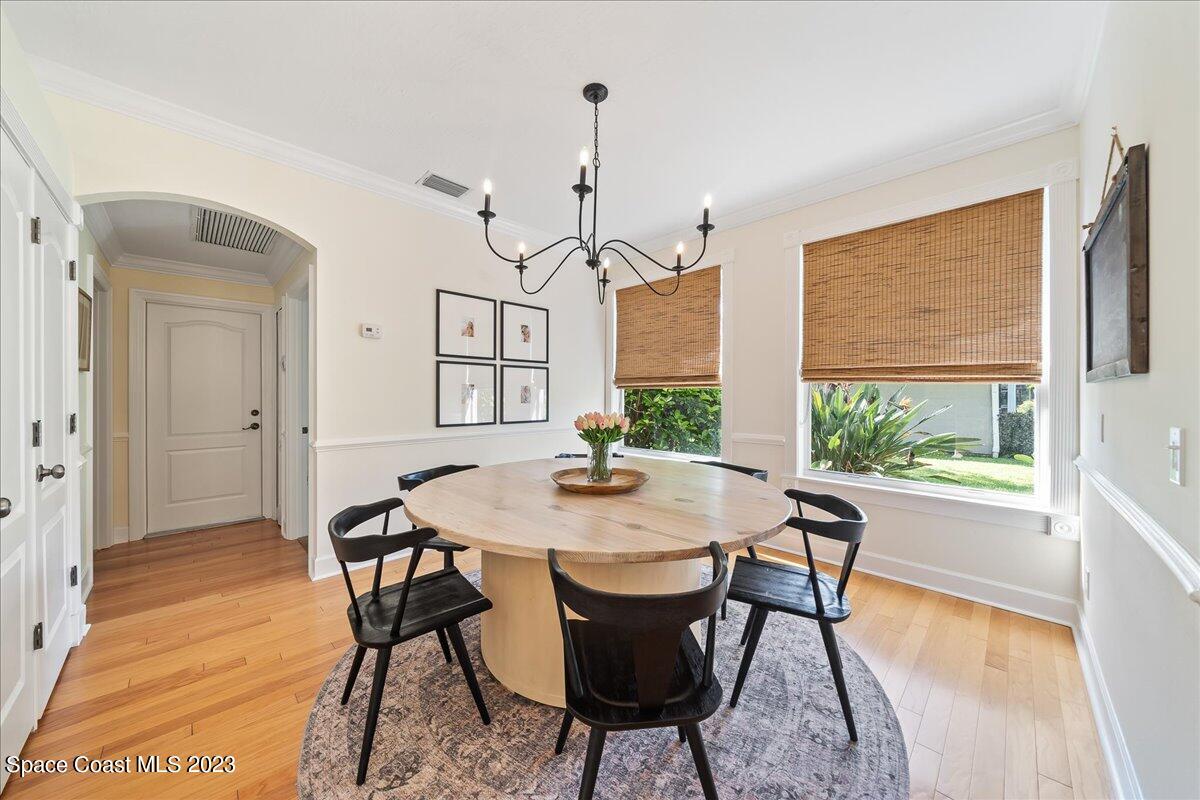 250 Baytree Drive Melbourne, FL 32940 - Photo 21 of 61 a view of a dining room with furniture window and wooden floor