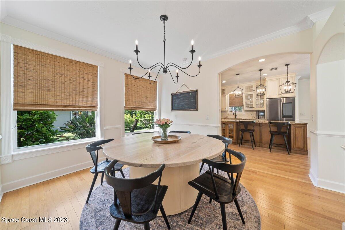 250 Baytree Drive Melbourne, FL 32940 - Photo 23 of 61 a view of a dining room with furniture window and wooden floor