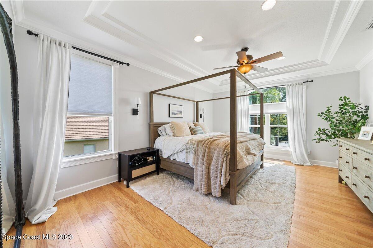 250 Baytree Drive Melbourne, FL 32940 - Photo 26 of 61 a bedroom with a bed and a window