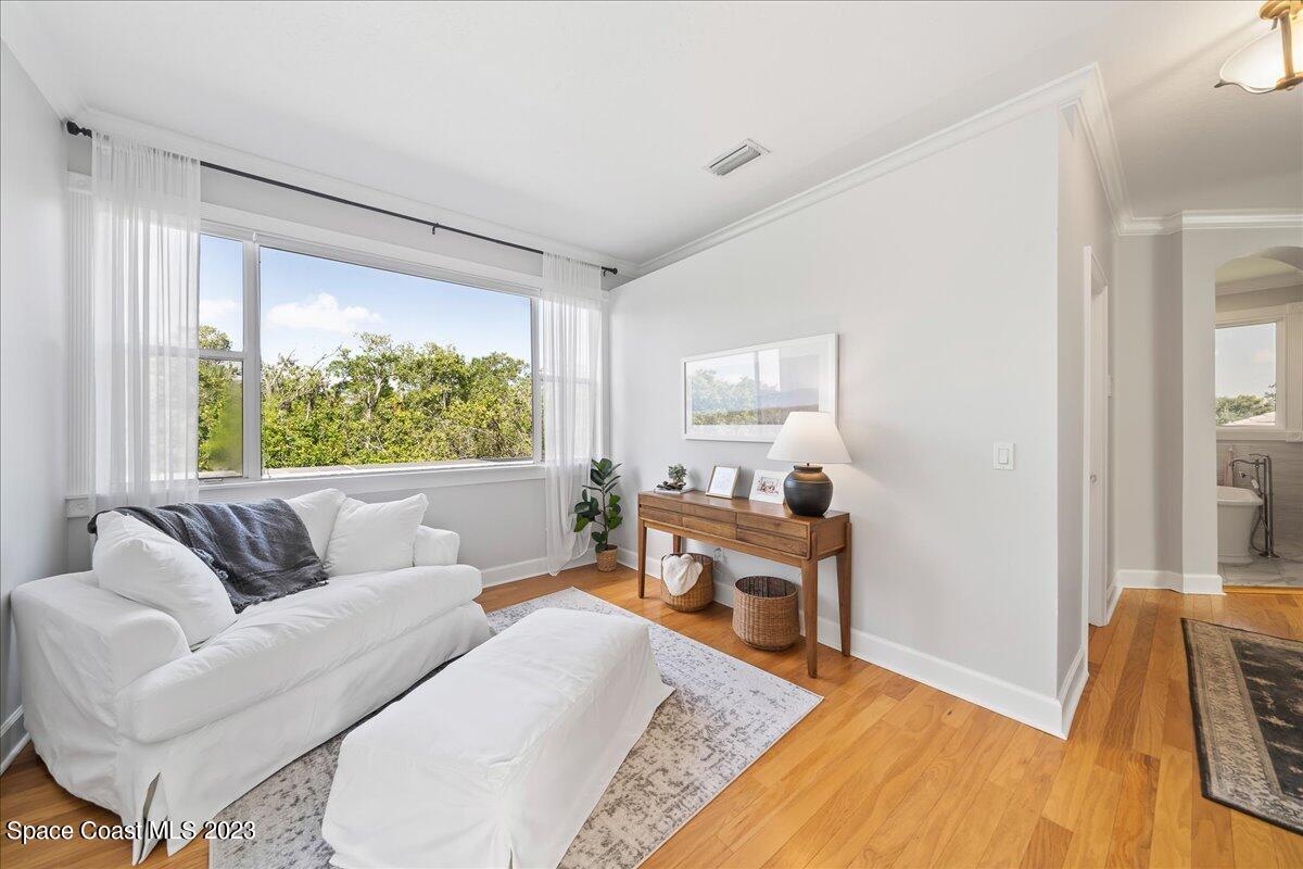 250 Baytree Drive Melbourne, FL 32940 - Photo 28 of 61 a living room with furniture and a window