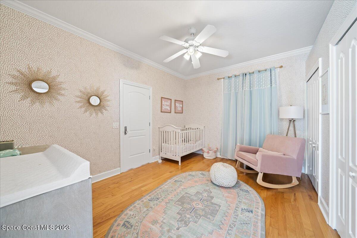 250 Baytree Drive Melbourne, FL 32940 - Photo 39 of 61 a bedroom with furniture and a window