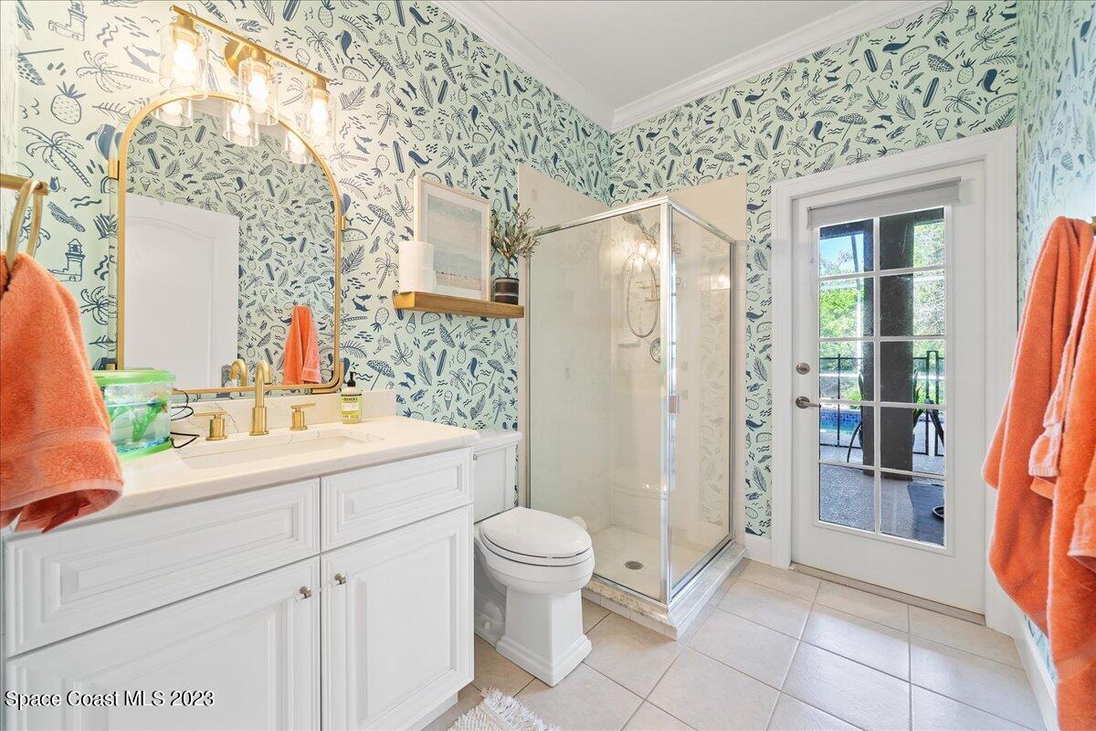 250 Baytree Drive Melbourne, FL 32940 - Photo 42 of 61 a bathroom with a sink and a mirror
