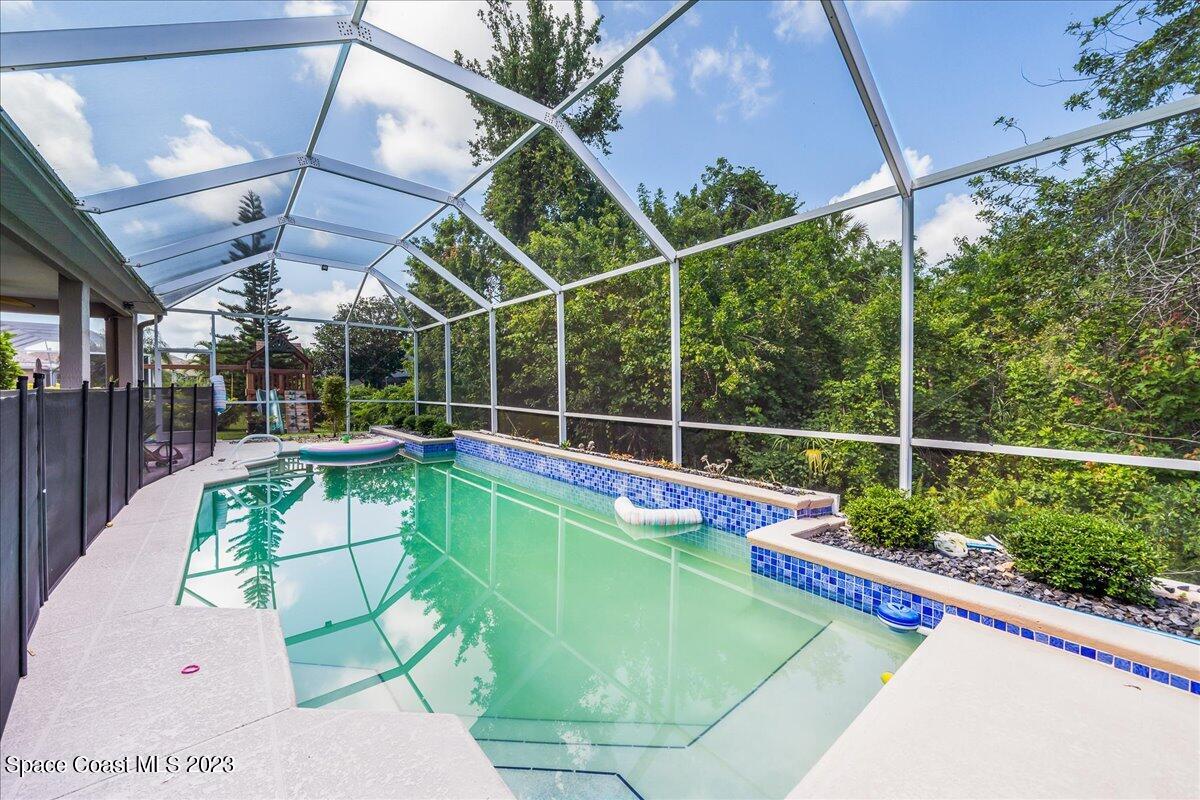 250 Baytree Drive Melbourne, FL 32940 - Photo 46 of 61 a view of a house with a backyard