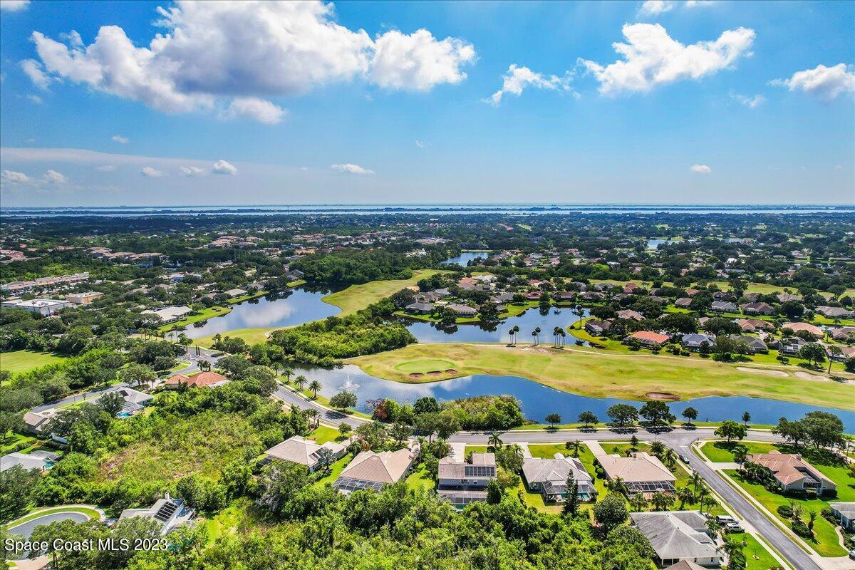 250 Baytree Drive Melbourne, FL 32940 - Photo 54 of 61 a view of a city with an ocean