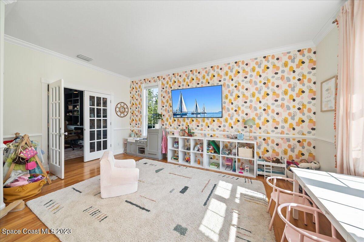250 Baytree Drive Melbourne, FL 32940 - Photo 9 of 61 a living room with furniture and a fireplace