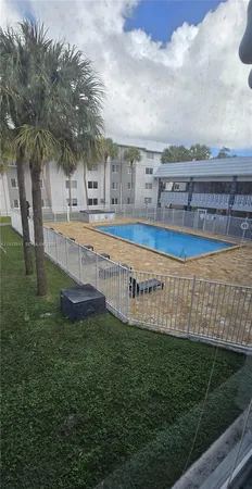 a view of a big yard next to a building