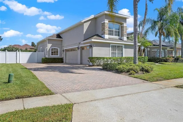 an aerial view of a house with garden