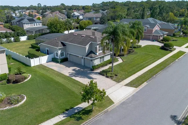 an aerial view of a house with a garden