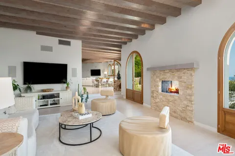 a view of swimming pool of a house with a garden