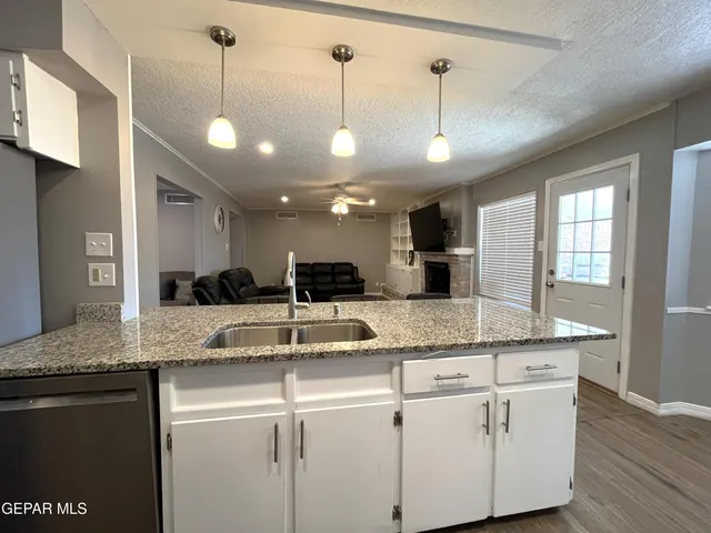 a view of a big room with wooden floor