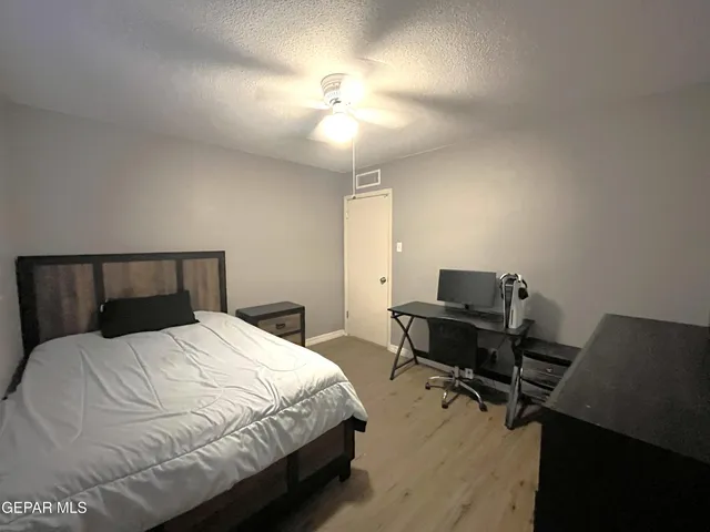 a bathroom with a toilet and a bathtub
