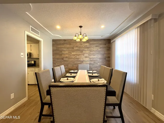 a view of a dining room with furniture