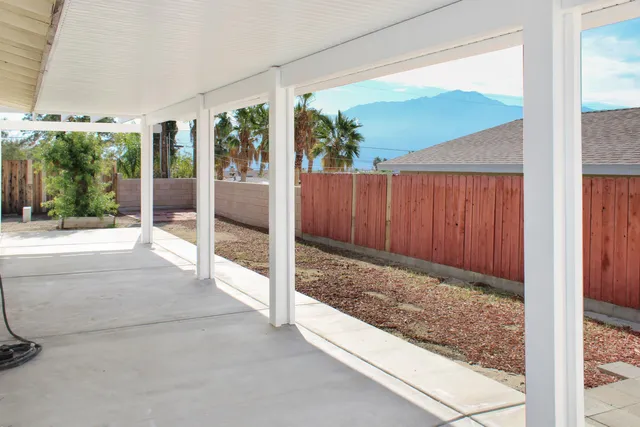 a view of backyard with green space